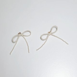 Zara, pendientes lazo de perlas