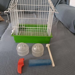 Jaula para pájaros blanca y verde
