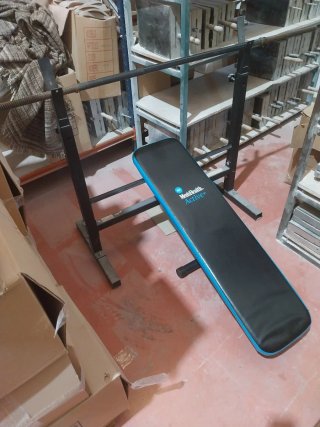 Disco de pesa,banco,barra y barras para mancuernas