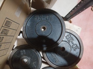 Disco de pesa,banco,barra y barras para mancuernas