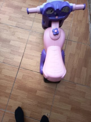 Mini moto de juguete rosa y morada