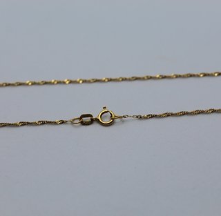 Cadena de oro de 18k. Peso: 1.18 gr.