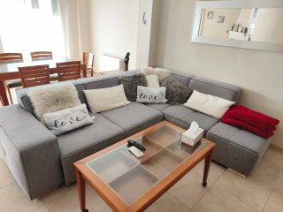 Sofá modular gris seminuevo