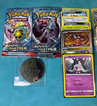 Sobres y cartas Pokémon variadas