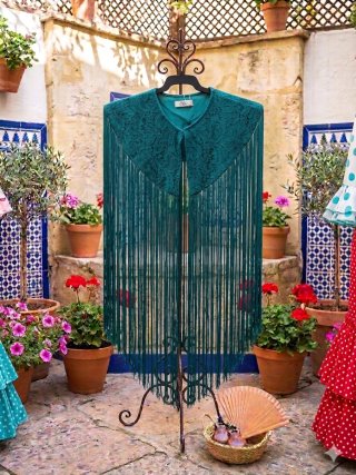 Capa de flecos verde