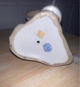 Figura porcelana Casades niño con pájaro