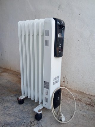Estufa Eléctrica Kilindo Blanca y Negra