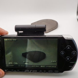 PSP Negra Sony con juegos