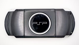 PSP Negra Sony con juegos