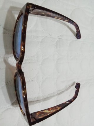 Gafas de sol Costa azules y marrones