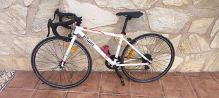 Bicicleta carretera niño Btwin blanca