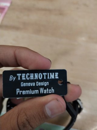 Reloj suizo nuevo negro, azul y plateado sin usar
