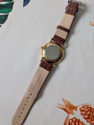 Reloj marrón piel