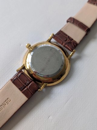 Reloj marrón piel