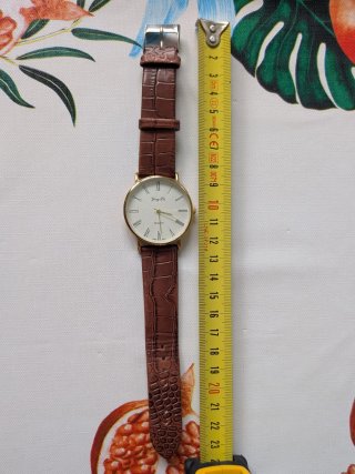 Reloj marrón piel