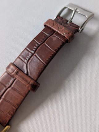 Reloj marrón piel