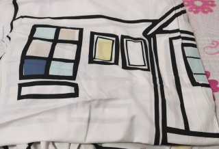 Tela infantil con estampado de casas