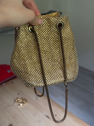 Bolso saco dorado pequeño