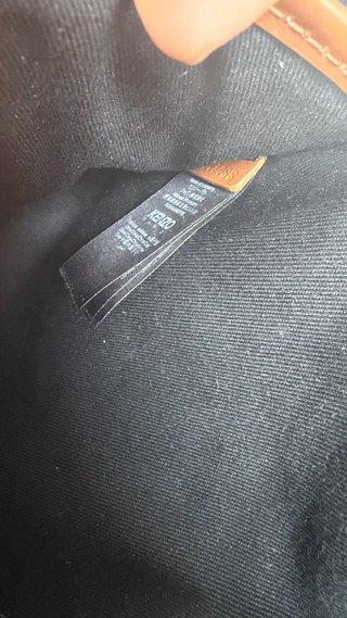 Mochila Kenzo negra con detalles marrones