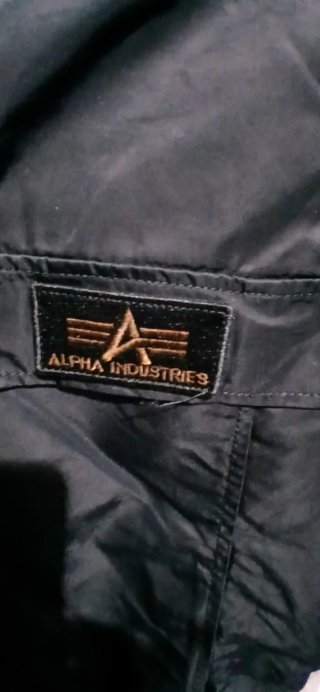 Chaqueta Alpha Industries Negra con Naranja