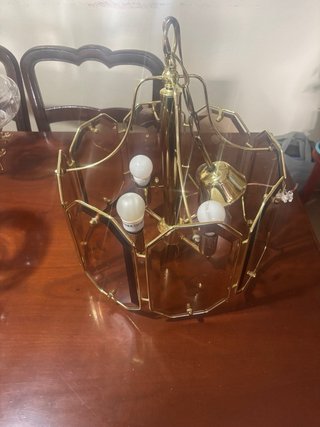 Lámparas de araña antiguas doradas