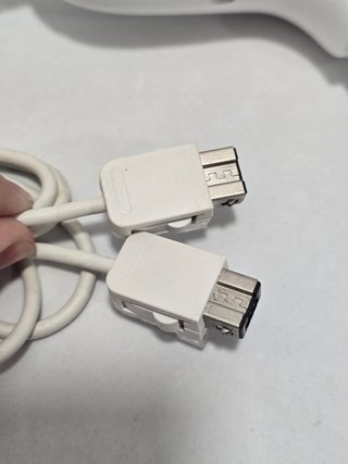2 mandos nintendo wii + 2 nunchuk blanco .
