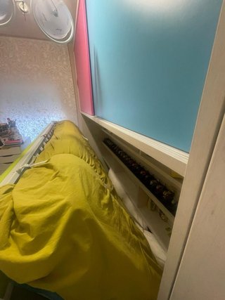 Cama abatible y armarios modulares