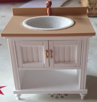 Mueble de baño miniatura con lavabo
