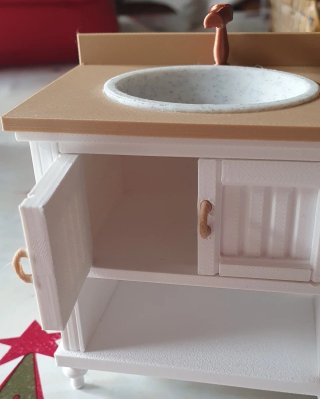 Mueble de baño miniatura con lavabo