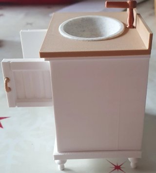 Mueble de baño miniatura con lavabo