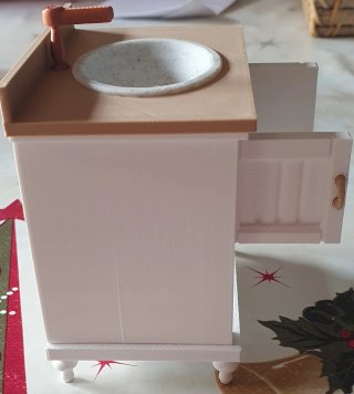 Mueble de baño miniatura con lavabo