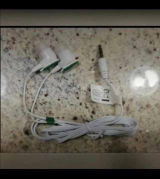 Auricolari per cellulare bianchi e verdi