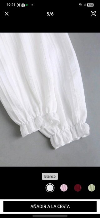 Blusa blanca manga larga con volantes