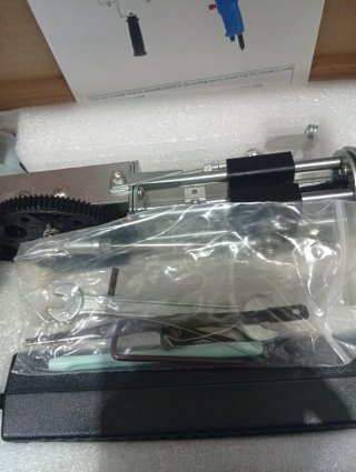 Pistola para tejer alfombras