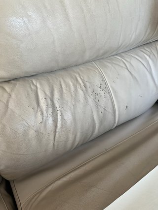 Sofá de piel beige 2 plazas