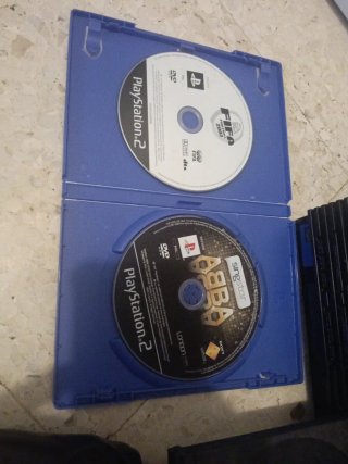 PlayStation 2 Negra con Mando y Juegos