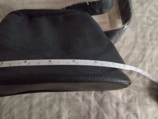 Bolso negro con cinturón