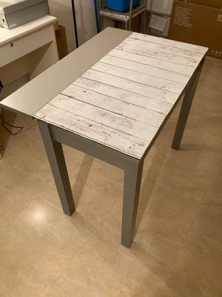Mesa de cocina extensible gris y blanca