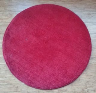 Alfombra roja de tela