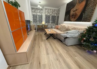 Mueble de comedor modular naranja y madera