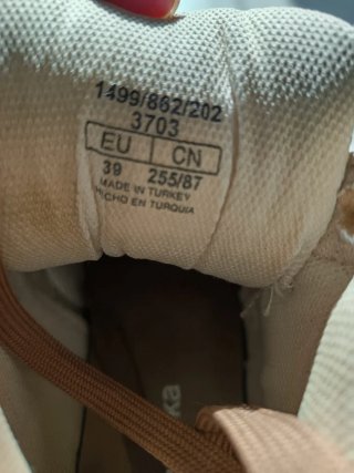 Zapatillas altas marrones y blancas