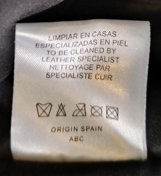 Abrigo largo de cuero negro sin estrenar