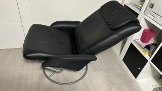 Sillón reclinable de cuero negro