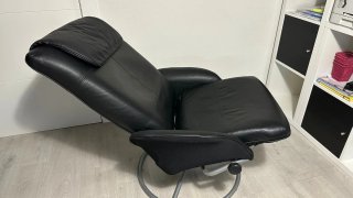 Sillón reclinable de cuero negro