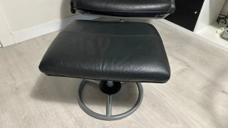 Sillón reclinable de cuero negro