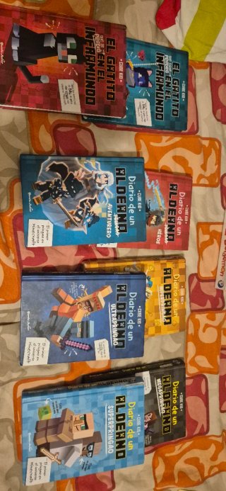 Colección de libros de un aldeano pringao.