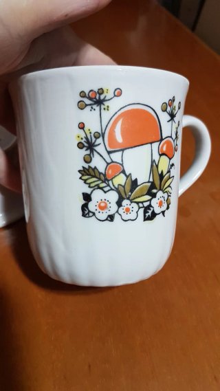 Tazza vintage in porcellana decorata