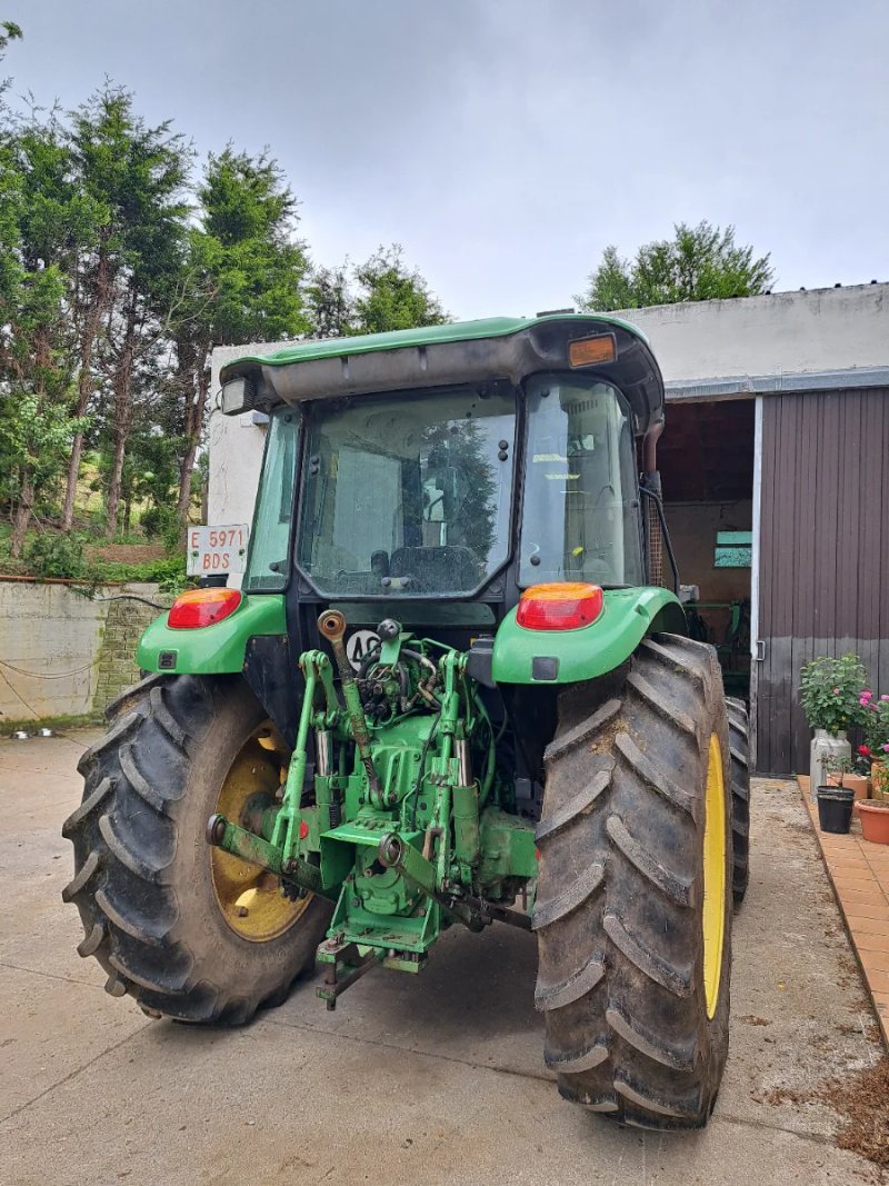 Tractor John Deere con pala