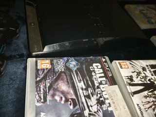 Consola PS3 Negra con 2 Mandos y Juegos