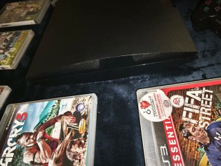 Consola PS3 Negra con 2 Mandos y Juegos